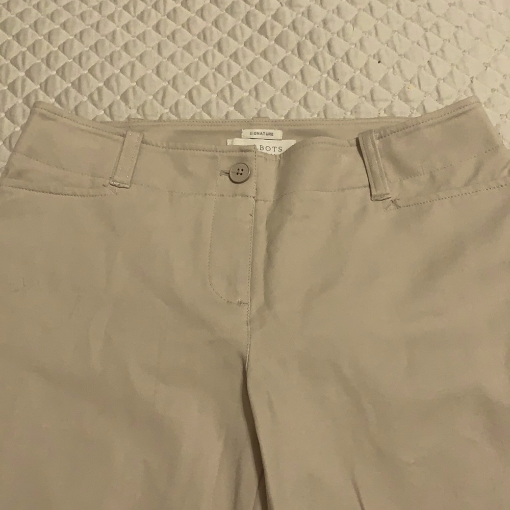Capri slacks with side slits.